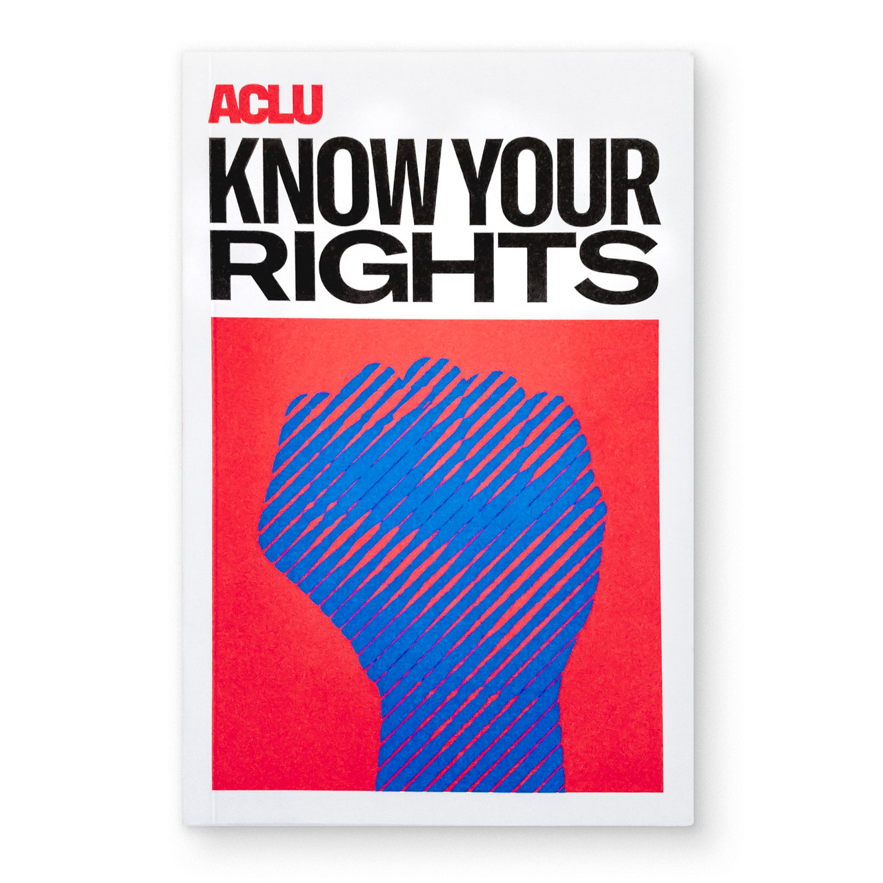 White book with blue fist that reads know your rights