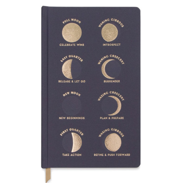 a charcoal gray journal with the phases of the moon printed in gold foil with phase names and intentions for each
